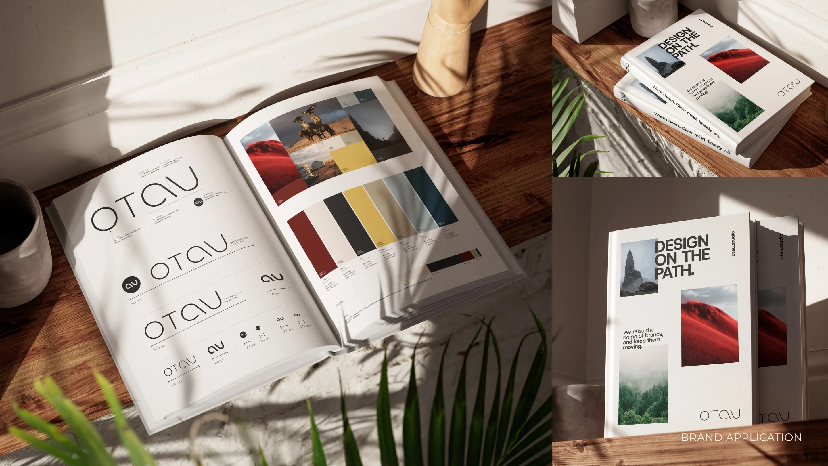 Open brand book with OTAU logo pages and colour bars, next to a magazine with red dunes