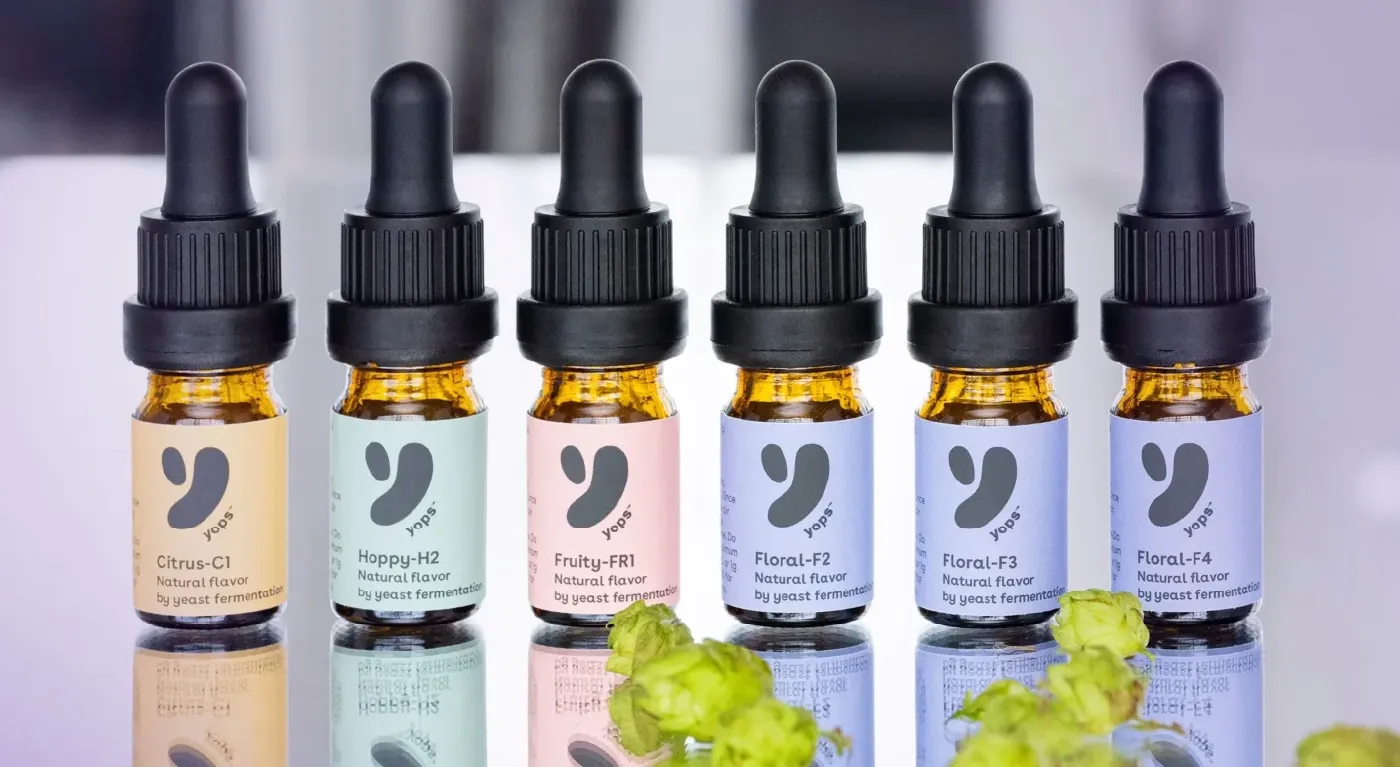 Six Yops® aroma bottles in a row: Citrus, Hoppy, Fruity and three Floral